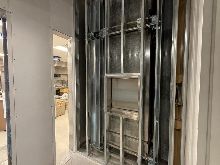 Dumbwaiter service opening